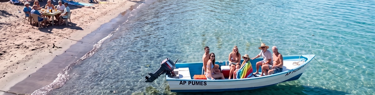 Visitors boating and relaxing on a beach near Loreto in Baja California Sur, Mexico